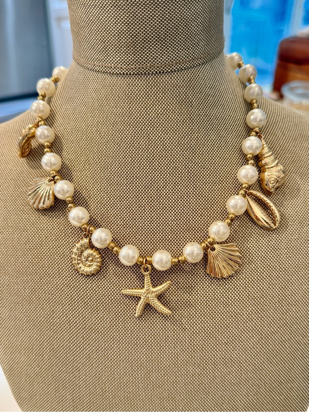 Gold Seashell Charm Necklace with White Pearls